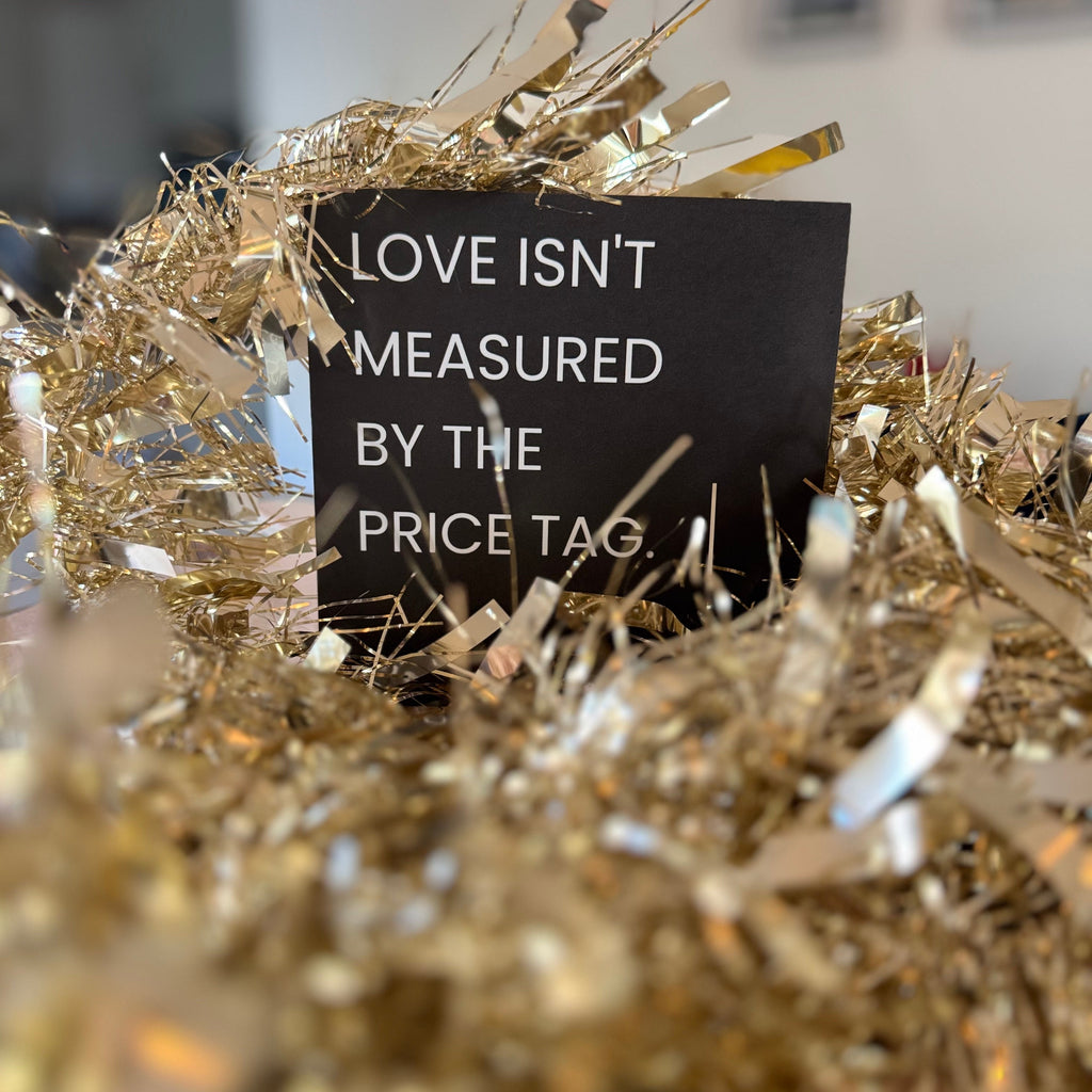 LOVE ISN'T MEASURED BY THE PRICE TAG.